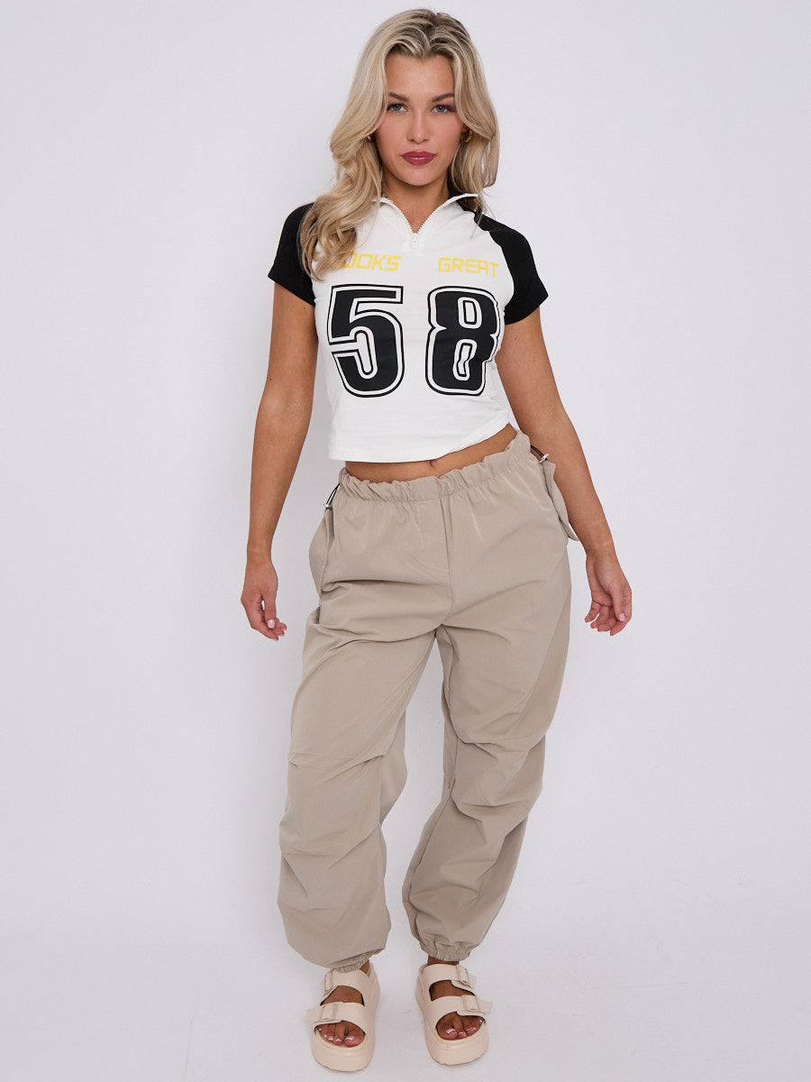 Looks Great Graphic Half Zip Crop Top
