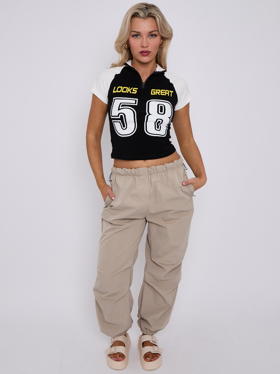 Looks Great Graphic Half Zip Crop Top