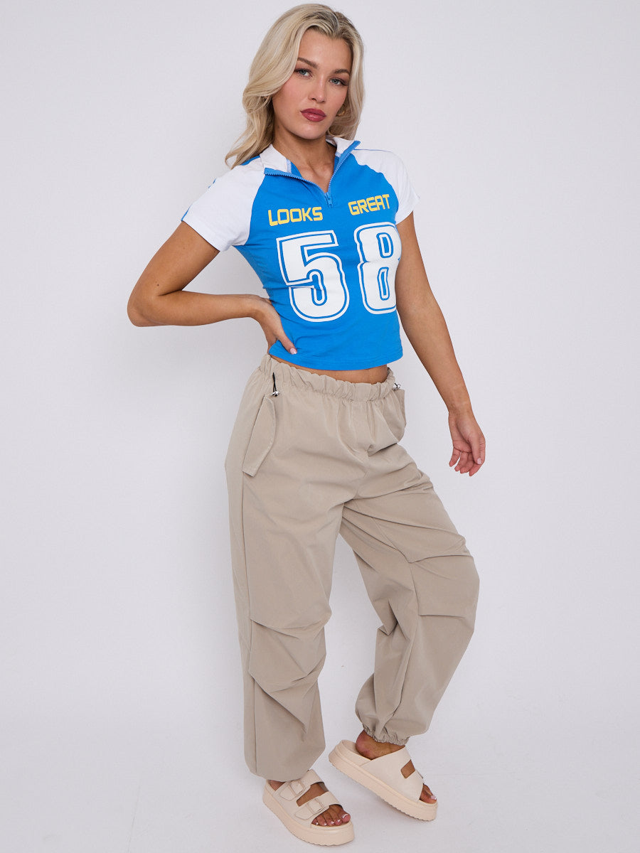 Looks Great Graphic Half Zip Crop Top