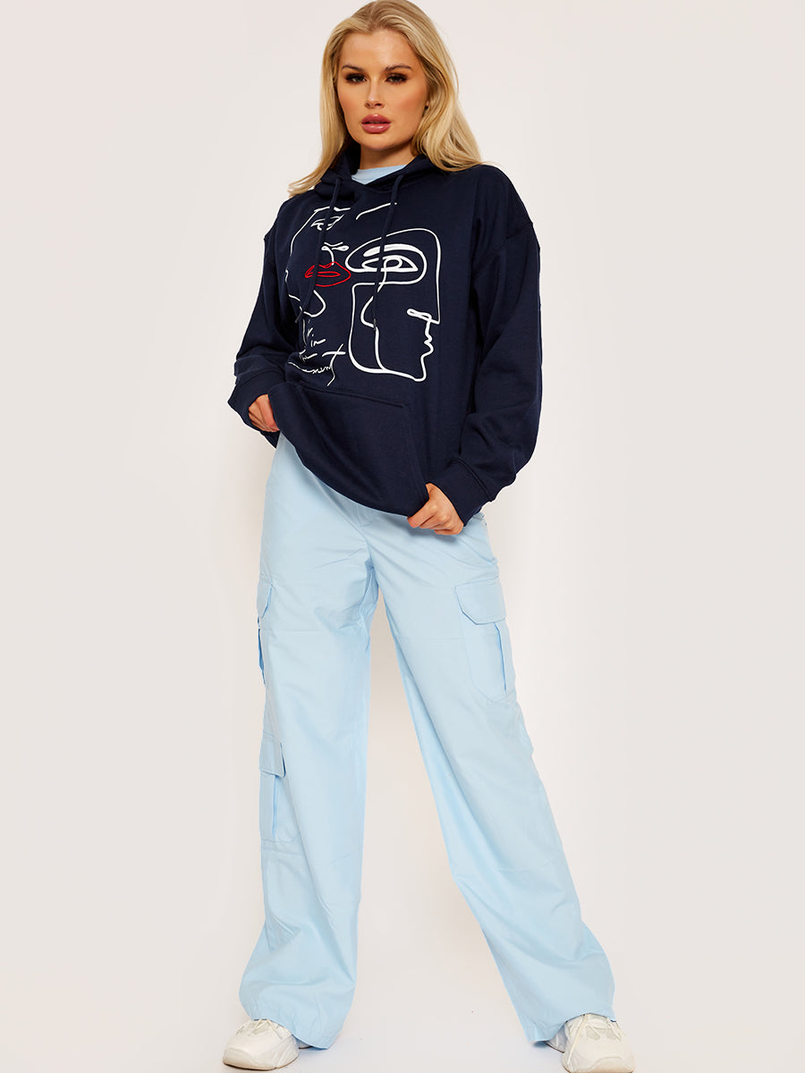 Face Graphic Hoodie with Embroidered Lip